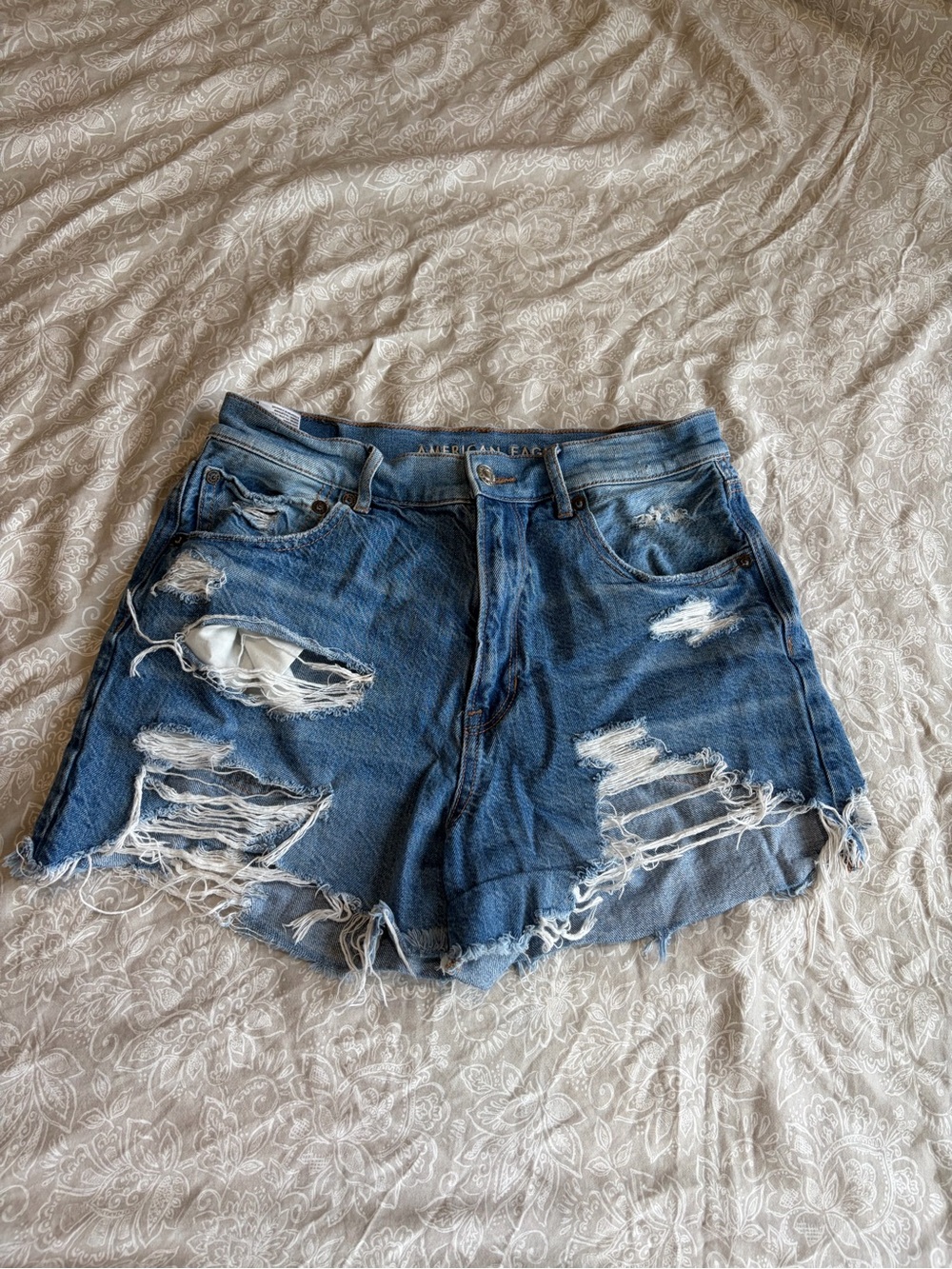 Distressed Blue Denim Women's Shorts - American Eagle Outfitters size 8